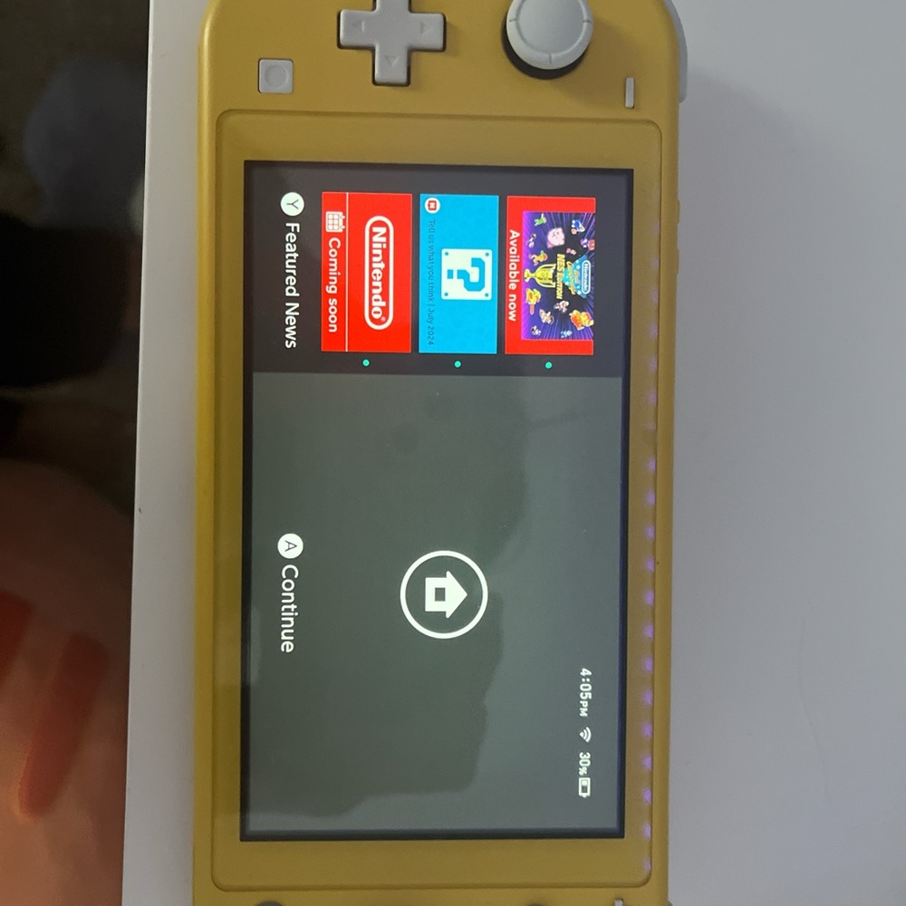 Nintendo switch lite with animal crossings and marioxRabbids